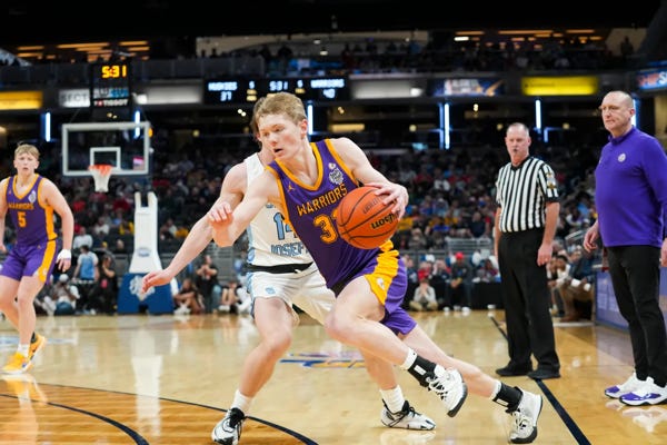 Scottsburg Warriors guard Kody Clancy (32) drives the lane against the South Bend St. Joseph Huskies on Saturday, March 30, 2024, during the IHSAA boys basketball Class 3A state championship game at Gainbridge Fieldhouse in Indianapolis. The Scottsburg Warriors defeated the South Bend St. Joseph Huskies 67-57. Joe Timmerman/IndyStar